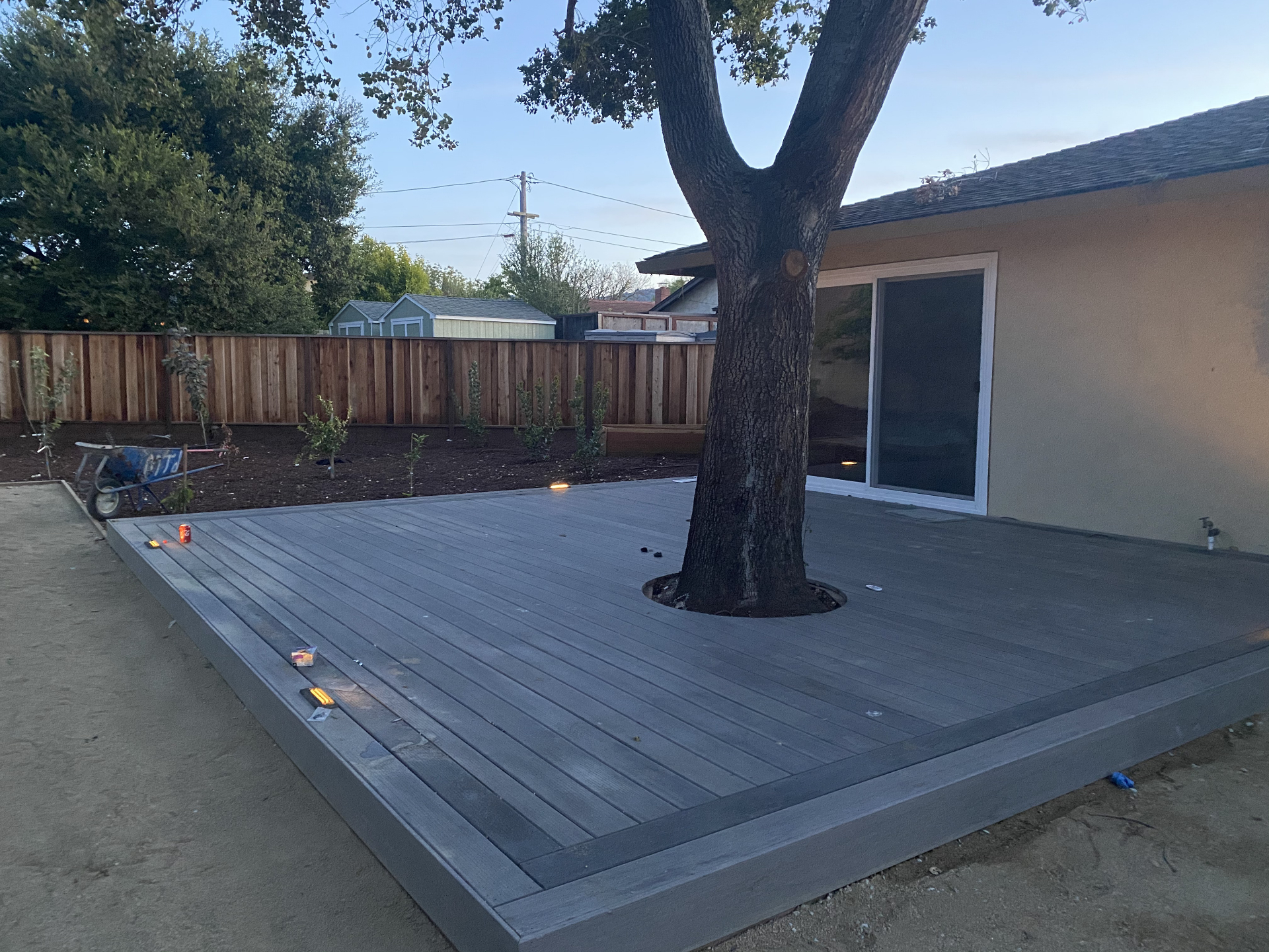 Custom Travertine Patio & Fire Feature by Skygrid Hardscaping