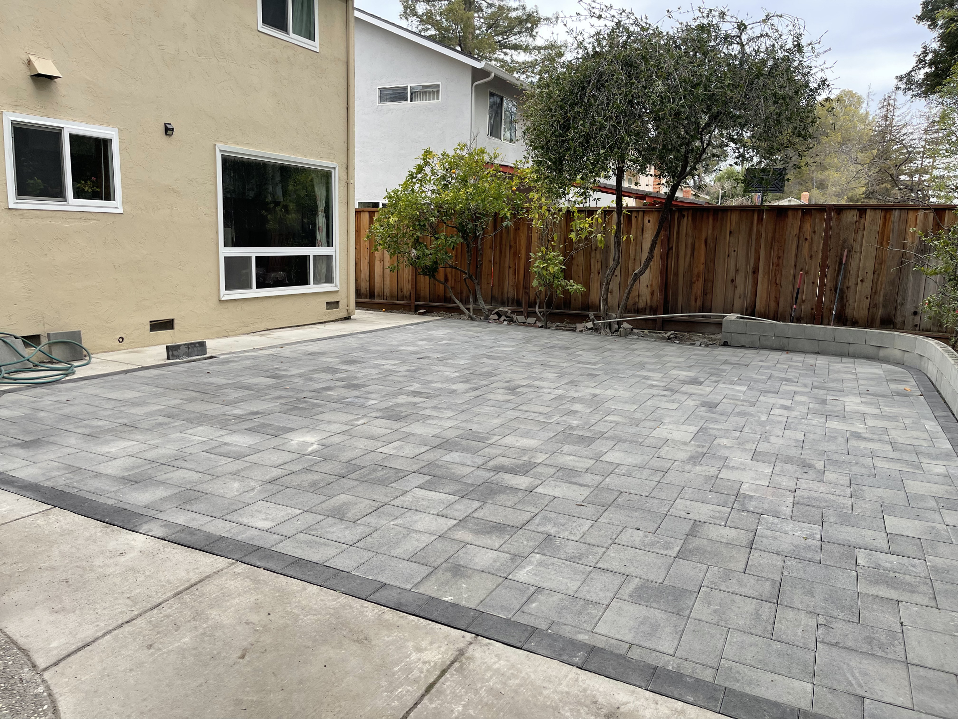 Interlocking Paver Systems hardscape project by Skygrid Hardscaping